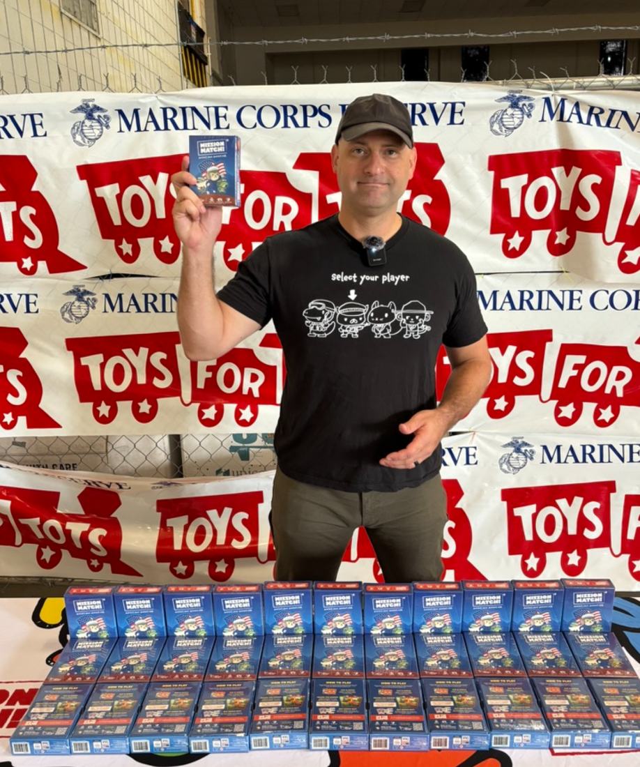 Mission Match decks laid out at a Marine Corps Toys for Tots drive